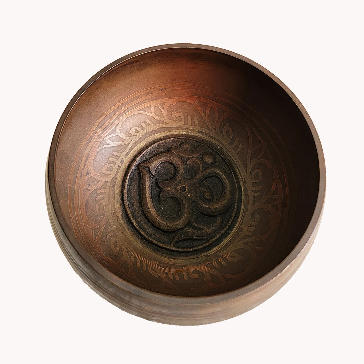 Om symbol singing bowl