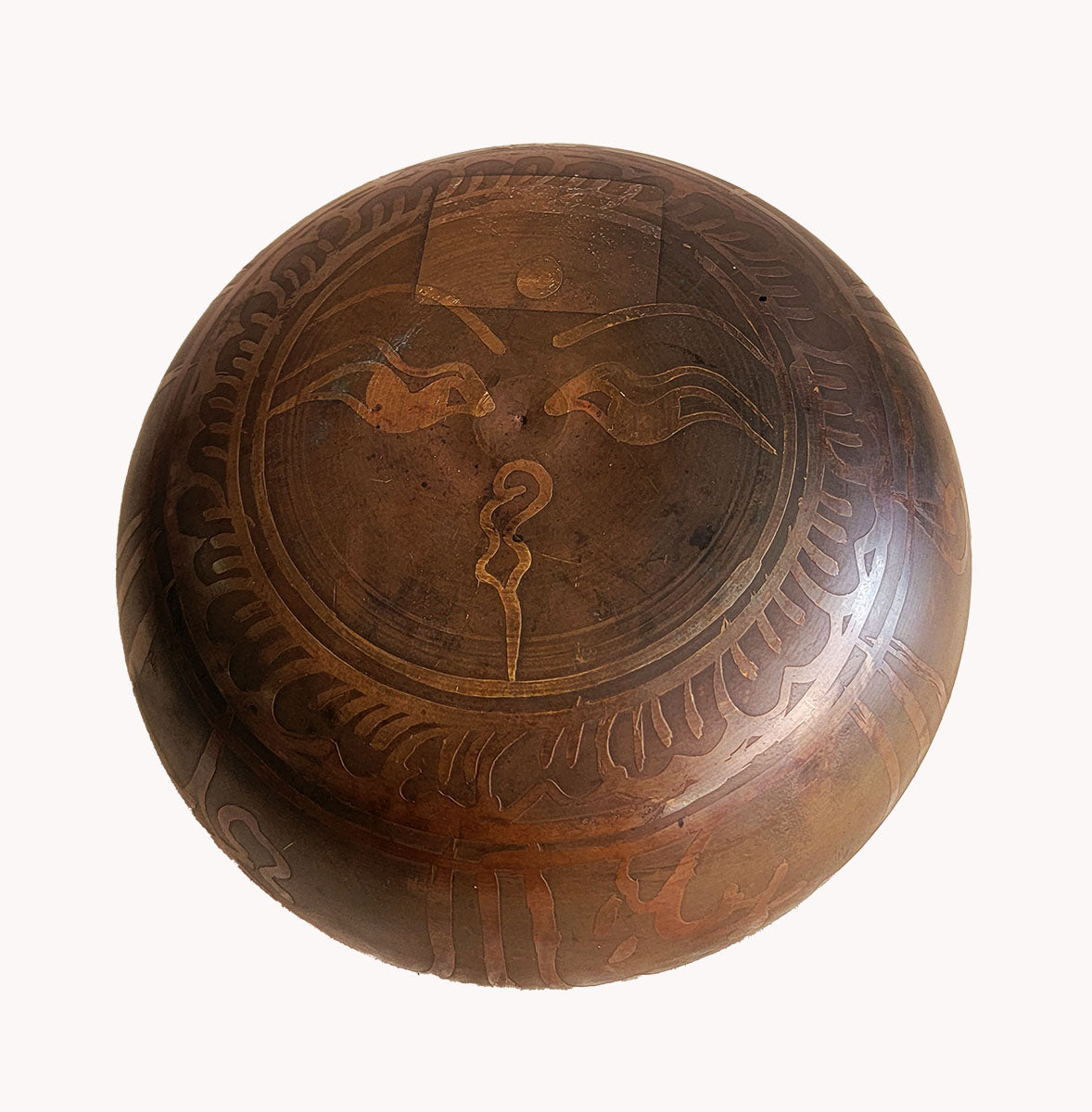 Om symbol singing bowl