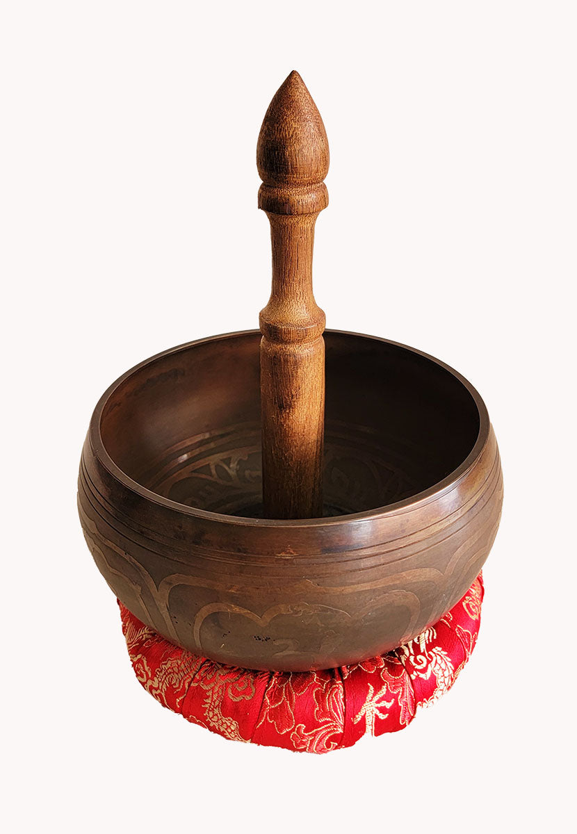 Om symbol singing bowl
