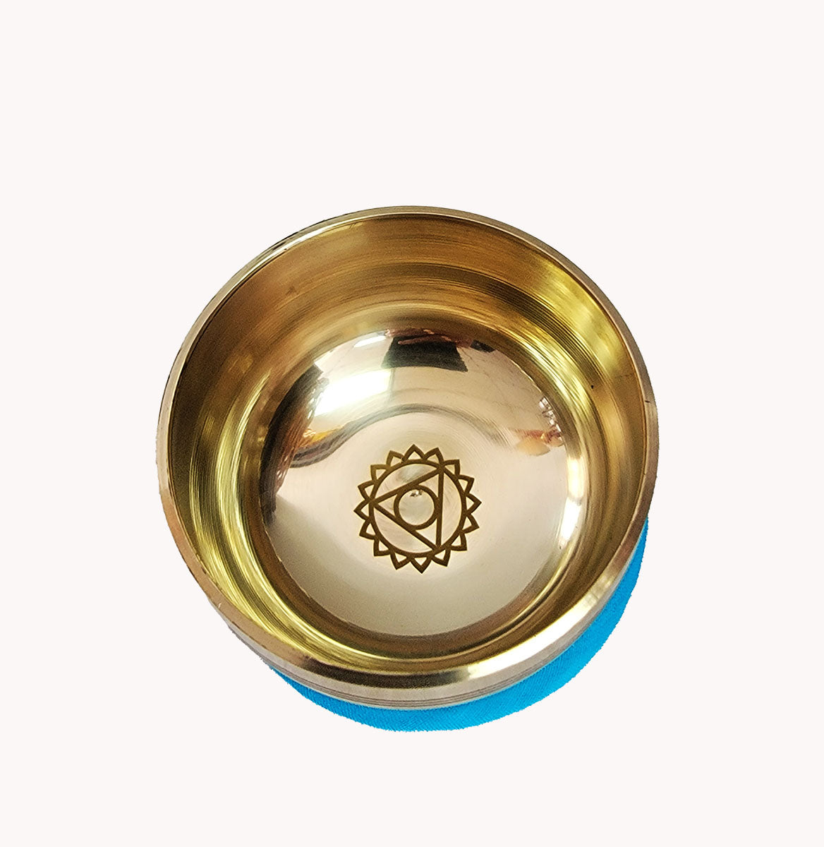 The throat chakra small singing bowl.